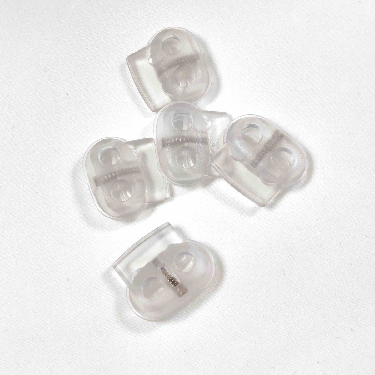Kordelstopper 2- Loch – transparent, oval